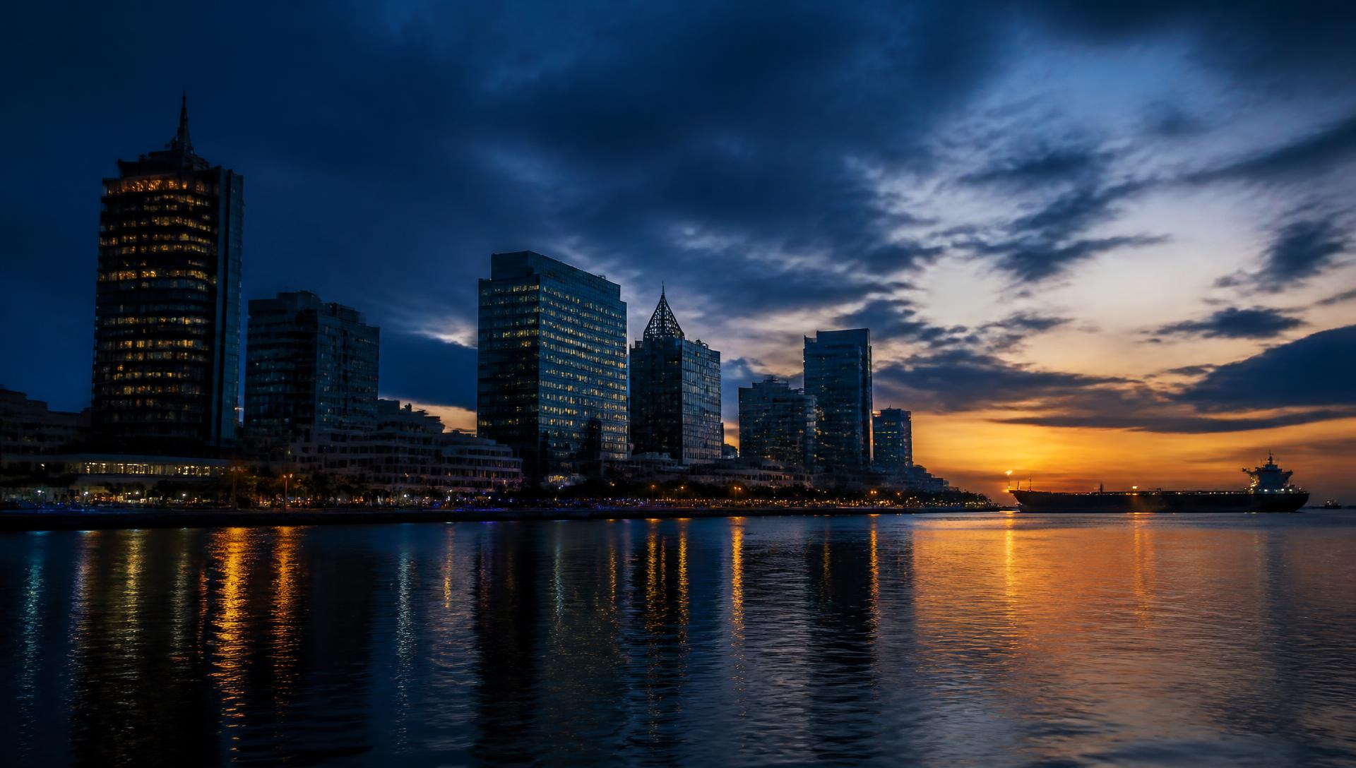 Nigerian corporate waterfront skyline at dusk with an oil tanker on the horizon